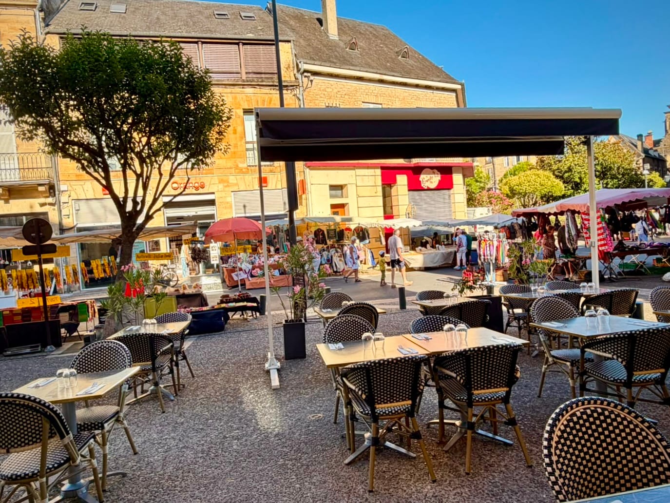 Terrace seating overlooking the lively market square